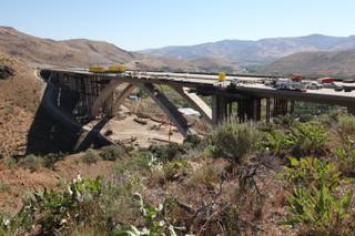 The Galena Creek Bridge, a 1,700 foot cathedral arch span in Pleasant Valley, south of Reno, Nev. is shown under construction in July 2011.